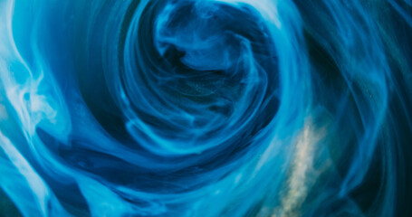 Smoke vortex. Ink cloud. Blur blue color glowing shiny haze cloud texture paint floating in water...