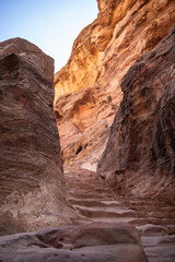 Vertical View of Rocky Stairs in Ad Deir Trail in Petra. Sandstone Canyon Cliff in Jordan. Rock Formation of Outdoor Scene in Middle East.