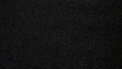 Obraz premium Dark, dusty, grainy, rough, earthy handmade black paper texture with visible fibers, for minimalistic art or backgrounds.