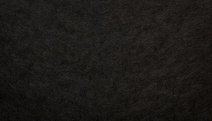 Dark, dusty, grainy, rough, earthy handmade black paper texture with visible fibers, for...