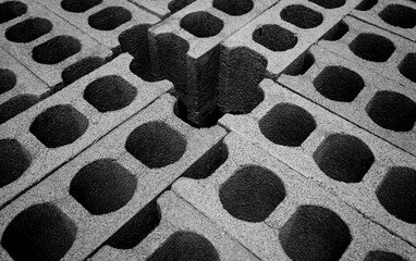 Concrete blocks with holes stacked on top of each other