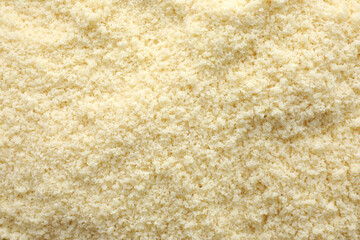 Fresh almond flour as background, above view