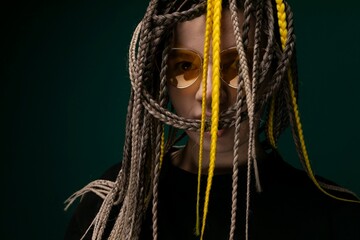 Woman With Yellow Dreadlocks and Black Shirt