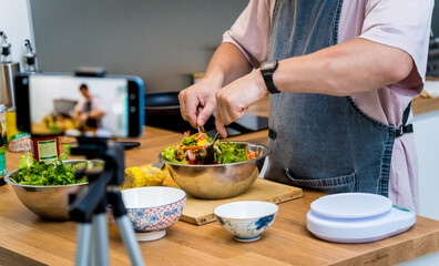 The chef is broadcasting live from workshop how to prepare a spicy glass noodle salad