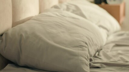 Man sleeping looking at screen mobile phone smartphone telephone late overslept male guy bedroom bed worried deadline morning routine stressed shocked rushing clock hurry punctuality panic quick fast