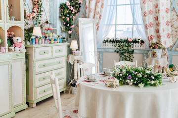 Elegant floral-themed dining room, vintage furniture, pastel green accents, floral arrangements on table, soft lighting, decorative shelves, window with sheer curtains, cozy atmosphere