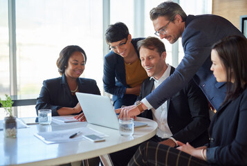 Business, people and happy on laptop in boardroom with strategy or idea on project, teamwork and collaboration. Employee, discussion and office in conversation as partners and plan as accountants