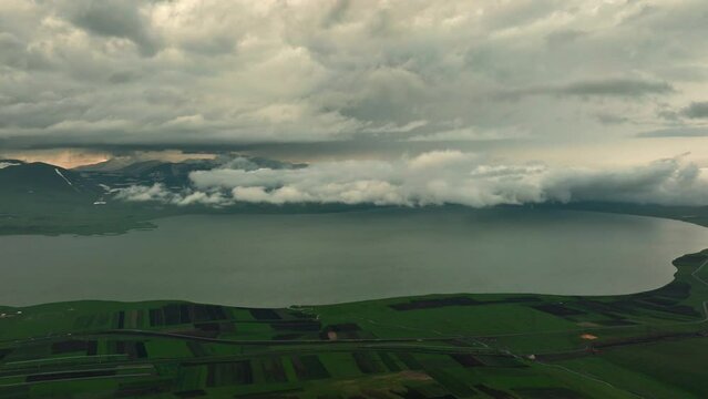 Aerial view of largest Paravani lake in Georgia, Samtskhe-Javakheti region. drone shot captures the stunning volcanic landscape, also known as Georgian Arctic.