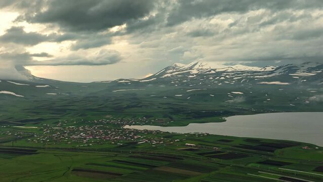 Aerial view of largest Paravani lake in Georgia, Samtskhe-Javakheti region. drone shot captures the stunning volcanic landscape, also known as Georgian Arctic.