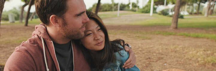 Fototapeta premium Couple having good time at picnic in the park. Close-up