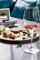 Wine glass with champagne on a table in restaurant