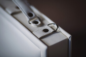 Details of white wedding photobook in leather box case. stylish designer gift box for photo books....
