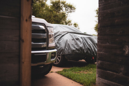 two cars parked on driveway