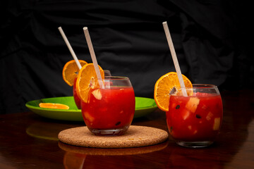 Fresh Watermelon Juices In Glass With Straw And Orange Slice