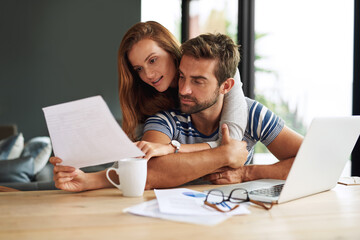 Finance, laptop and tax with couple in home together for bank investment or savings. Accounting,...