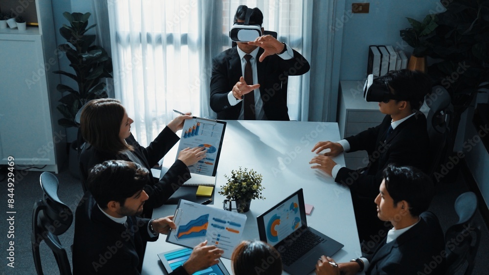 Poster top view of manager working on laptop and sending data analysis to business people by using vr glass