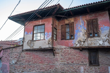 Traditional Kula houses with wooden structure in Turkish and Ottoman architectural style, Manisa, Türkiye. Historical buildings and houses on the streets of Manisa.