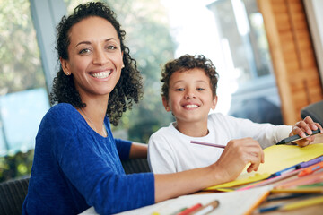 Smile, mother and son in portrait drawing on paper together for learning, playing and development in home. Happy, woman and boy child with notes for support, education and teaching in house with love