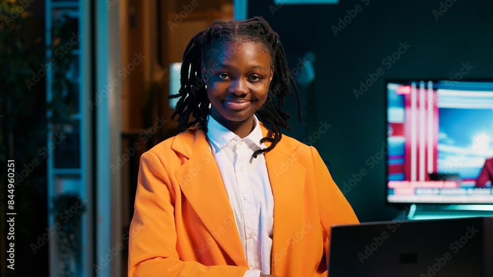 Poster portrait of business student creating online surveys or questionnaires for research projects, adding