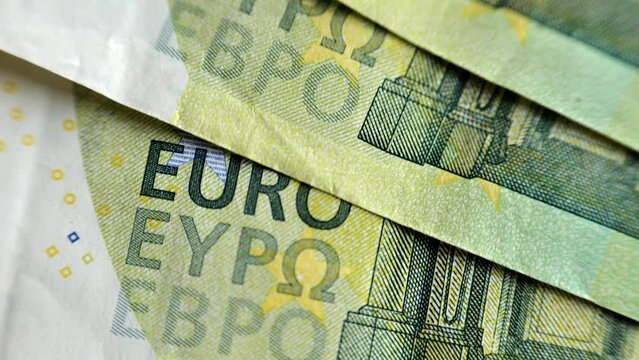 One hundred euro bill close-up.salaries and earnings in Europe. Currency notes and symbols.Cash payments in the European Union. 4k footage