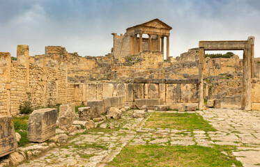 Fototapeta premium Remaining of the roman City of Dougga with the Capitol, Tunisia