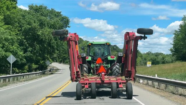 A driver's perspective stuck behind a slow moving tractor trailer on a highway in Ohio. Frustration concept.  	