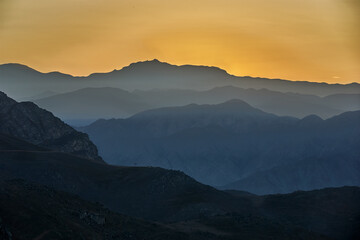 The Andes Mountains shrouded in fog create a mystical and ethereal atmosphere. As the mist weaves...