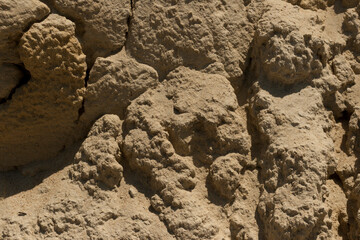 Sandstone. Petrified sand in a quarry. Erosion of the sand hill.