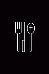 A black and white image of a fork and spoon