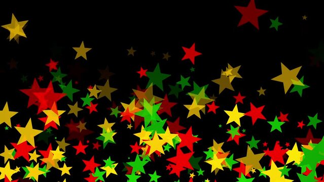 Stars floating upward in bold red, yellow, and green colors on black background for Juneteenth, or Freedom Day, to commemorate the ending of slavery on June 19th 1865 in the United States of America.