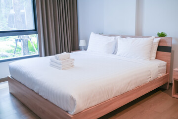 Modern bed room concept, the bed in bed room of hotel.
