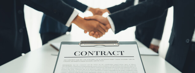 Two business executive shake hand in boardroom, sealing agreement merging two company. Handshake...