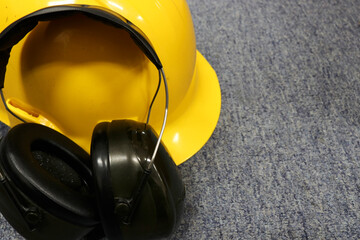 Photo of earmuffs and safety helmets, this safety equipment is to protect the head and protect the ears from noise
