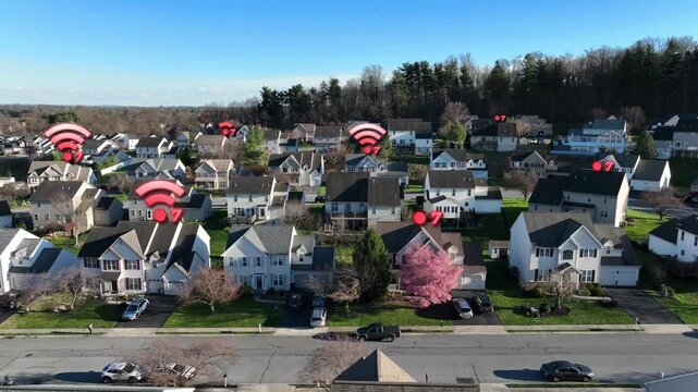 Wifi 7 symbols in American neighborhood. High tech, futuristic, fast wifi speeds in houses with fiber optic data transfer. Aerial truck shot with motion graphic animation.