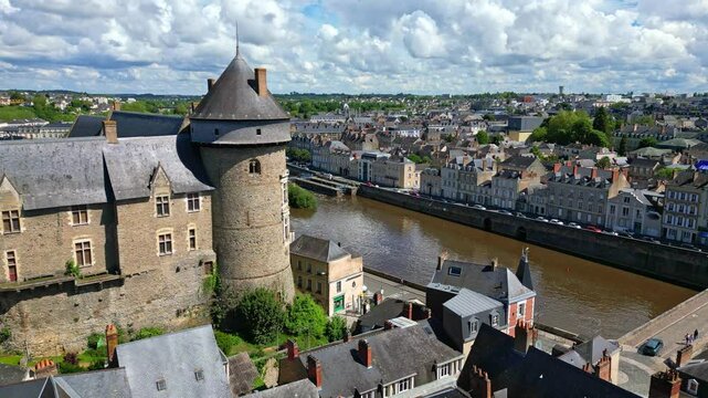 Chateau de Laval castle and old bridge over Mayenne in France. Aerial drone pov