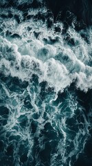 Fototapeta premium Majestic Waves Colliding with the Shoreline from Above