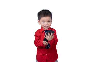 Little small smiling happy boy 3-4 years old wearing a red shirt and holding in hand play smartphone isolated on white background studio portrait. Children and gaming addiction and lifestyle concept
