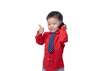Adorable smiling little boy talking on smartphone and showing thumb it's good isolated on white background. Concept of communication and Mother's Day love family lifestyle. Copy space