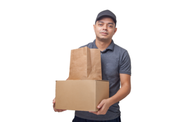 Delivery man holding cardboard box and paper packaging. Delivery concept. Delivery boy concept.