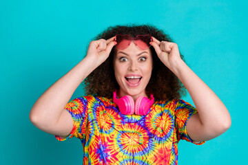 Photo of cheerful nice girl wear trendy print clothes summer mood isolated on cyan color background