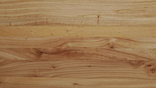 Elm wood table top panning up and down overhead background. Elm wood table top background.