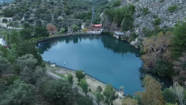 Evening aerial video over Lake Zaros on the island of Crete, Greece.