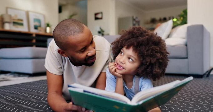 Home, father on floor and boy reading book, love and storytelling with smile, happiness and bonding together. Family, parent or dad with kid, son or childhood development with knowledge, joy or break