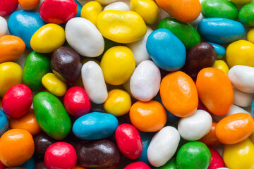 Bright multi-colored candies dragee. Texture of sweets and confectionery.
