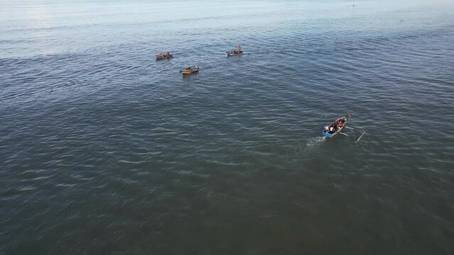 Fishing boats anchored off Ladghar beach at Dapoli, located 200 kms from Pune on the West Coast of Maharashtra India.