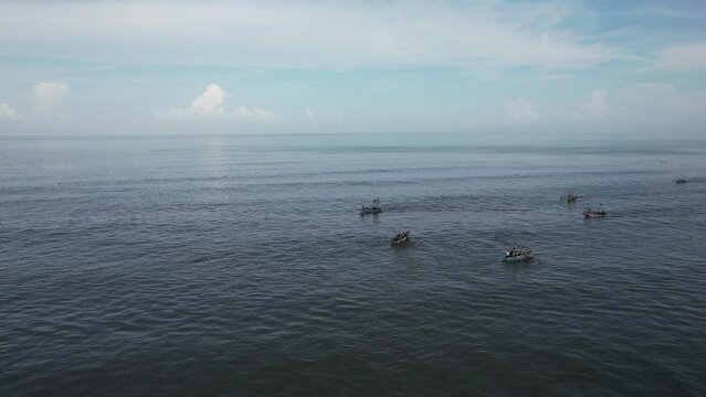 Fishing boats anchored off Ladghar beach at Dapoli, located 200 kms from Pune on the West Coast of Maharashtra India.