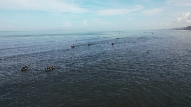 Fishing boats anchored off Ladghar beach at Dapoli, located 200 kms from Pune on the West Coast of Maharashtra India.