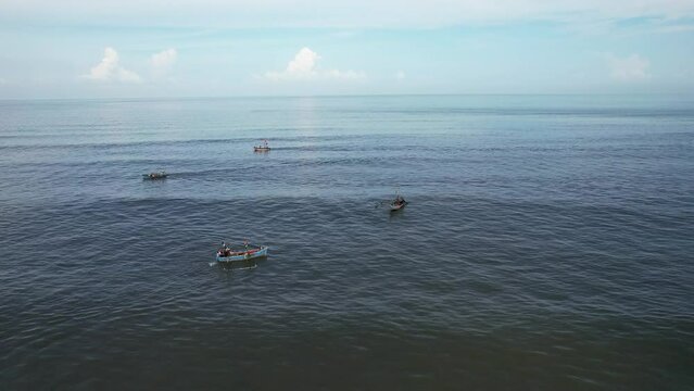Fishing boats anchored off Ladghar beach at Dapoli, located 200 kms from Pune on the West Coast of Maharashtra India.