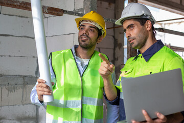 Professional construction engineer team, Two man engineer wear uniform holding laptop looking at...