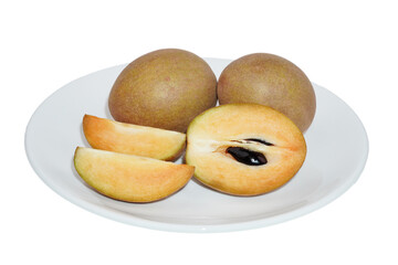delicious sapodilla fruit in white serving plate isolated transparent
